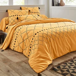 Fantasie Bedlinnen|Vlak Laken<Blancheporte Bedlinnen Massai, in katoen met grafische motieven, afgewerkt met pompons kerrie