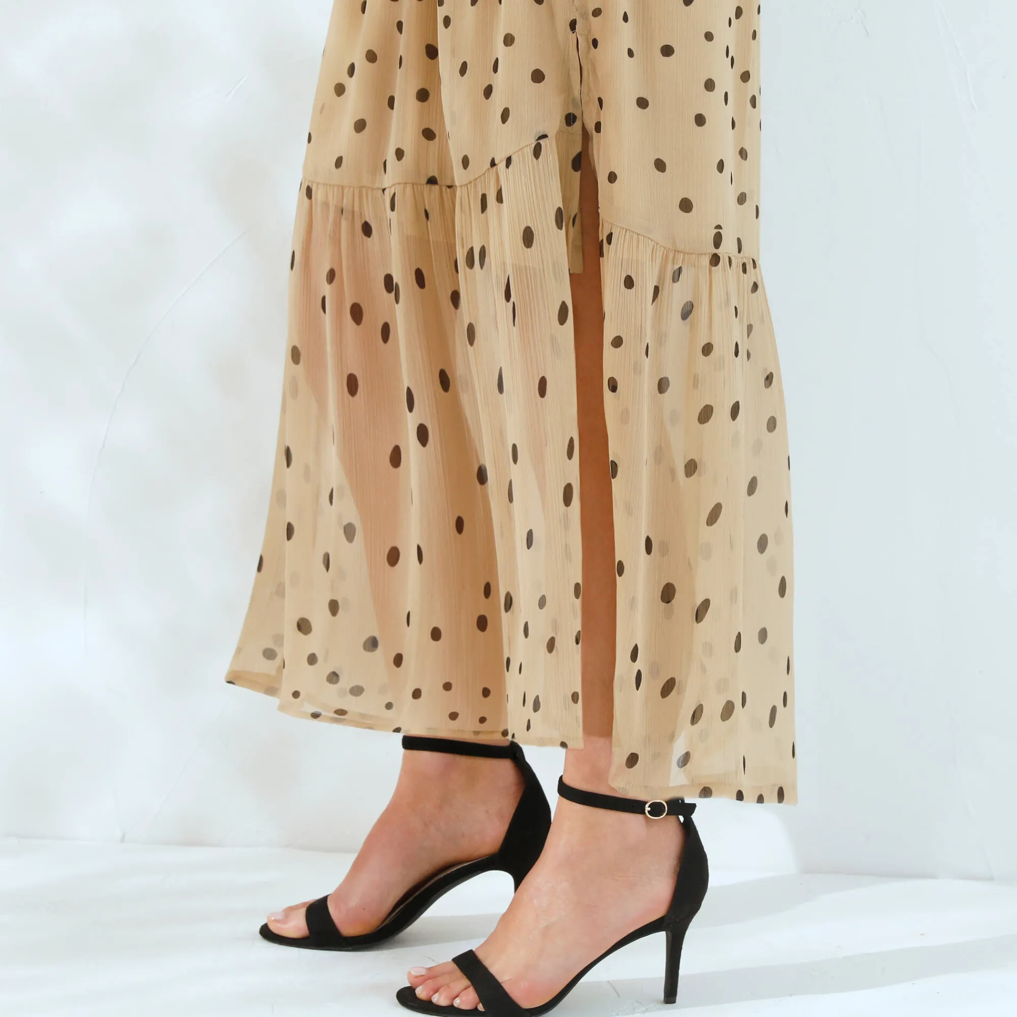 Jurk<Blancheporte Bedrukte voile mouwloze wikkeljurk beige / zwart