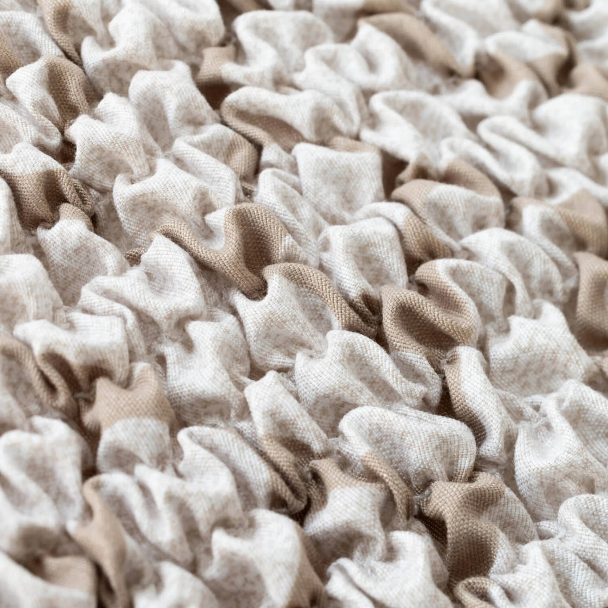 Zitbankhoes<Blancheporte Bi-rekbare, grafische hoes in gewafelde microvezel voor fauteuil en zetel beige
