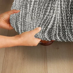 Zitbankhoes<Blancheporte Bi-rekbare hoes in microvezel met golvenmotief, voor fauteuil en zitbank grijs
