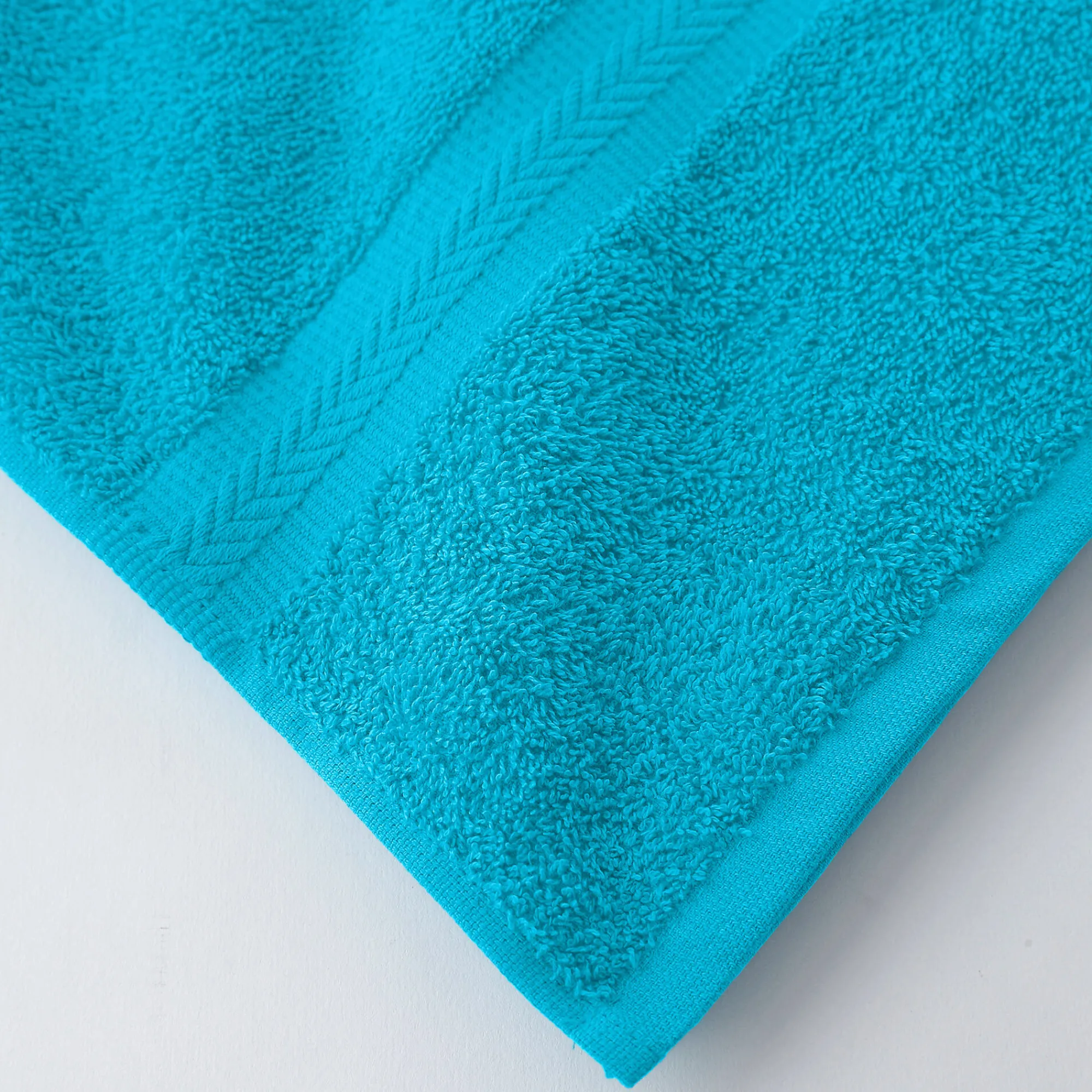 Badhanddoek<Colombine Collectie effen handdoeken 420 g/m2 met zacht comfort turkoois
