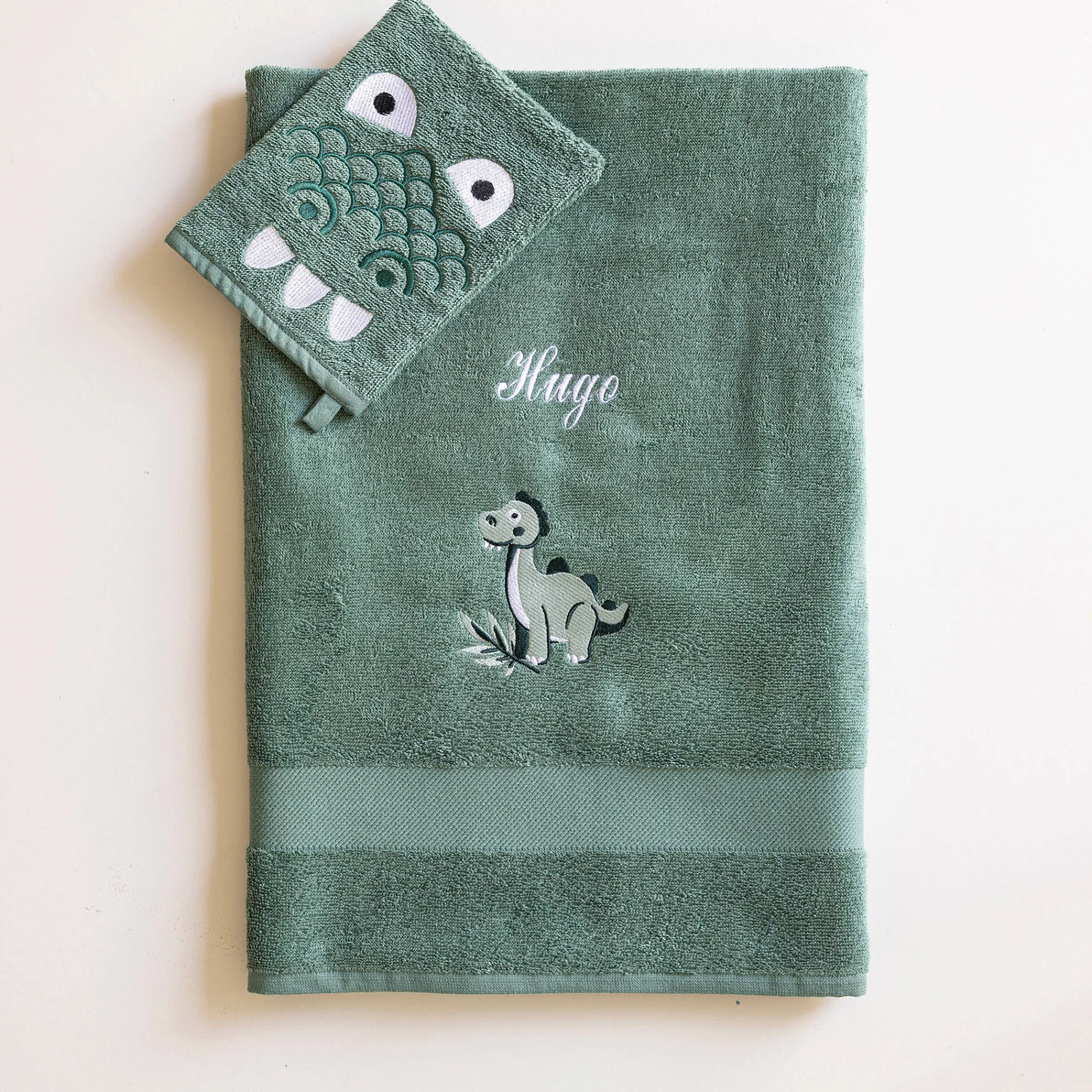 Badhanddoek|Handdoek En Badlaken Kids<Colombine des petits Collectie geborduurd kinderbadlinnen in katoen met dinosaurusmotief, personaliseerbaar - 380 g/m2 eucalyptus