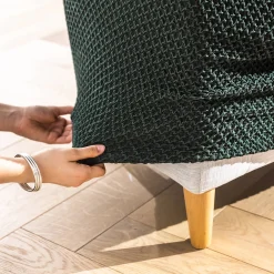 Zitbankhoes<Blancheporte Getextureerde, bi-rekbare hoes voor zitbank en fauteuil met armleuningen groen