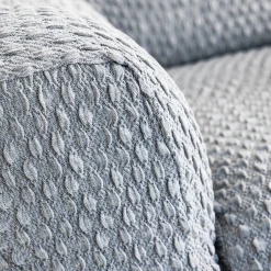 Zitbankhoes<Blancheporte Gewafelde, bi-rekbare hoes voor zitbank en fauteuil met armleuningen grijs