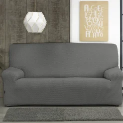 Zitbankhoes<Blancheporte Gewafelde, bi-rekbare hoes voor zitbank en fauteuil met armleuningen grijs