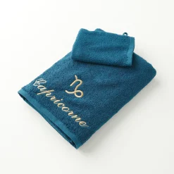 Badhanddoek<Blancheporte Handdoeken met "Capricorne" borduursel - 420 g/m2 pauwblauw