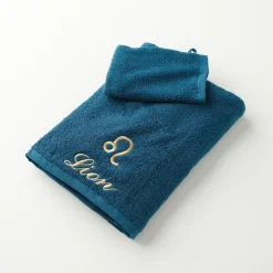 Badhanddoek<Blancheporte Handdoeken met "Lion" borduursel - 420 g/m2 pauwblauw