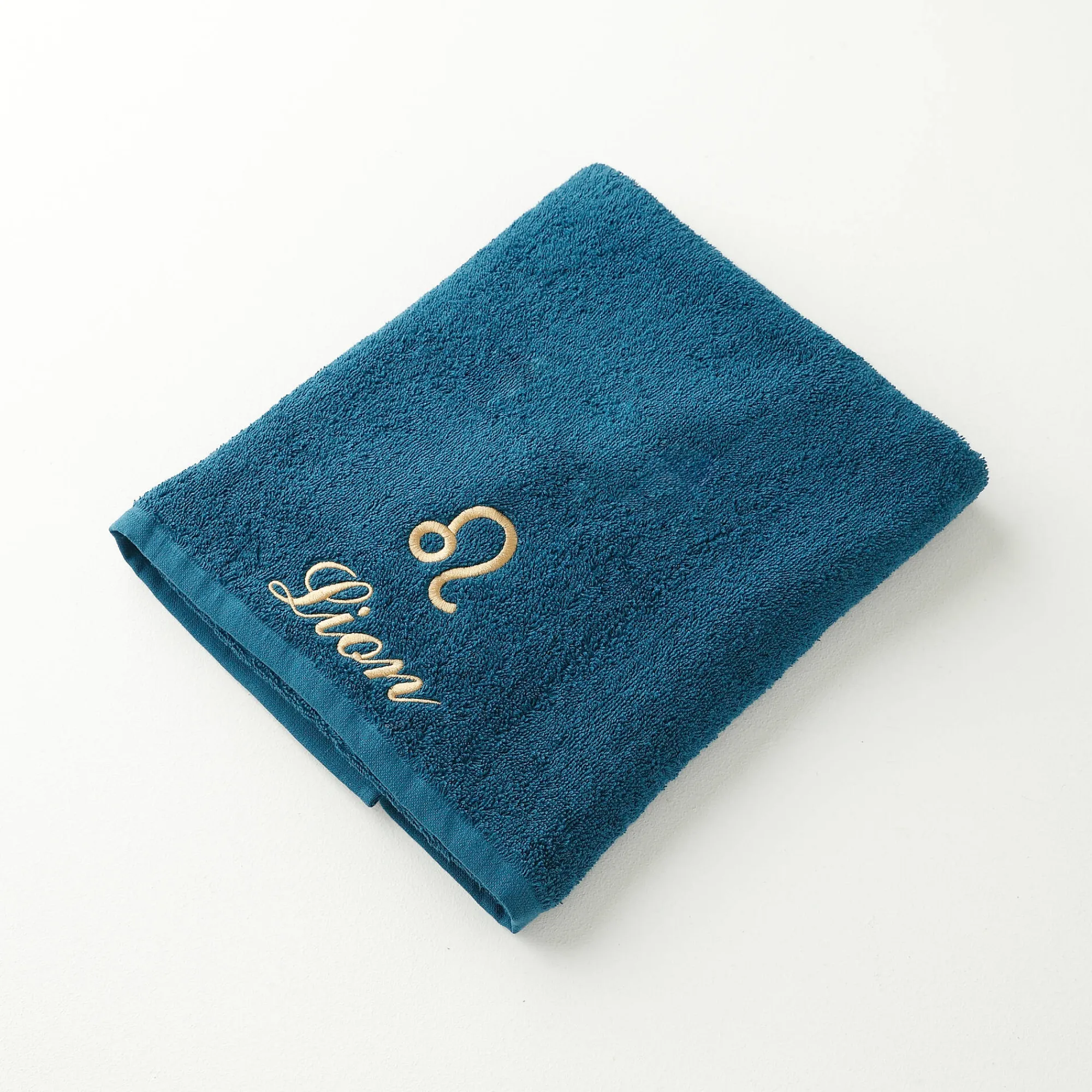 Badhanddoek<Blancheporte Handdoeken met "Lion" borduursel - 420 g/m2 pauwblauw