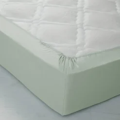 Hoeslaken<Colombine Hoeslaken in effen jersey, hoeken van 26 cm amandel groen