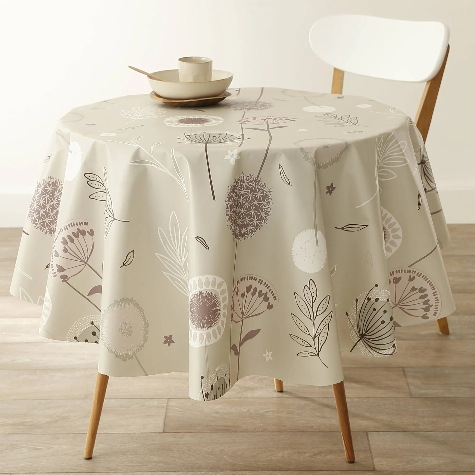 Tafelkleed<Blancheporte Tafellaken in toile cirée met paardenbloemmotief taupe