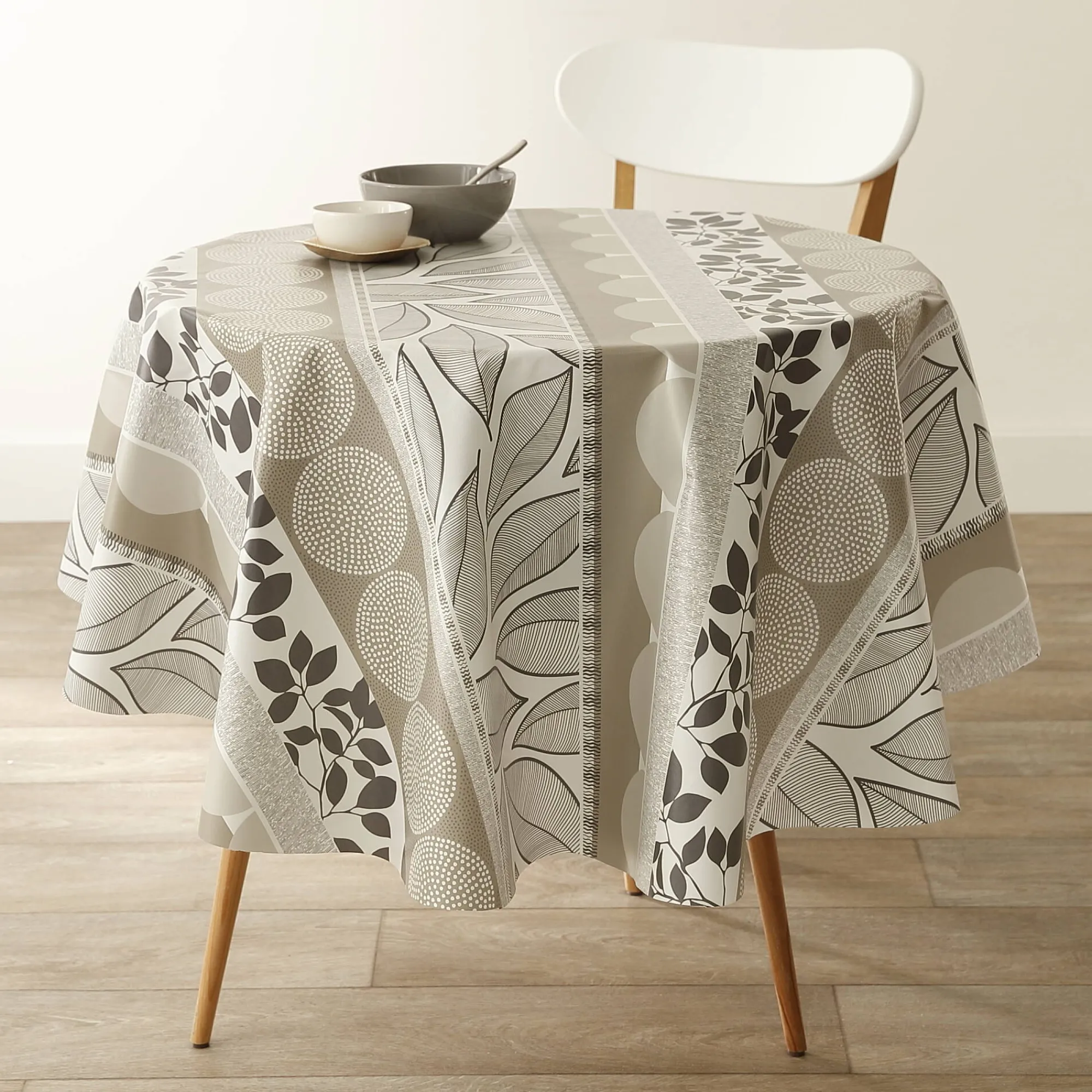 Tafelkleed<Blancheporte Tafellaken in toile cirée met bladeren- en tafellopereffect taupe / wit