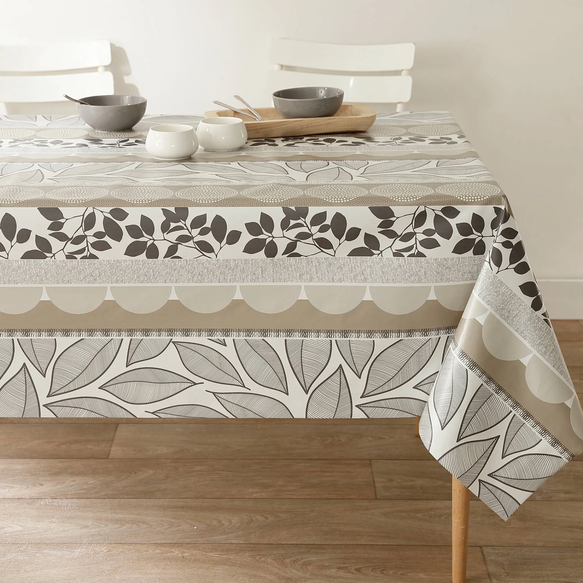 Tafelkleed<Blancheporte Tafellaken in toile cirée met bladeren- en tafellopereffect taupe / wit