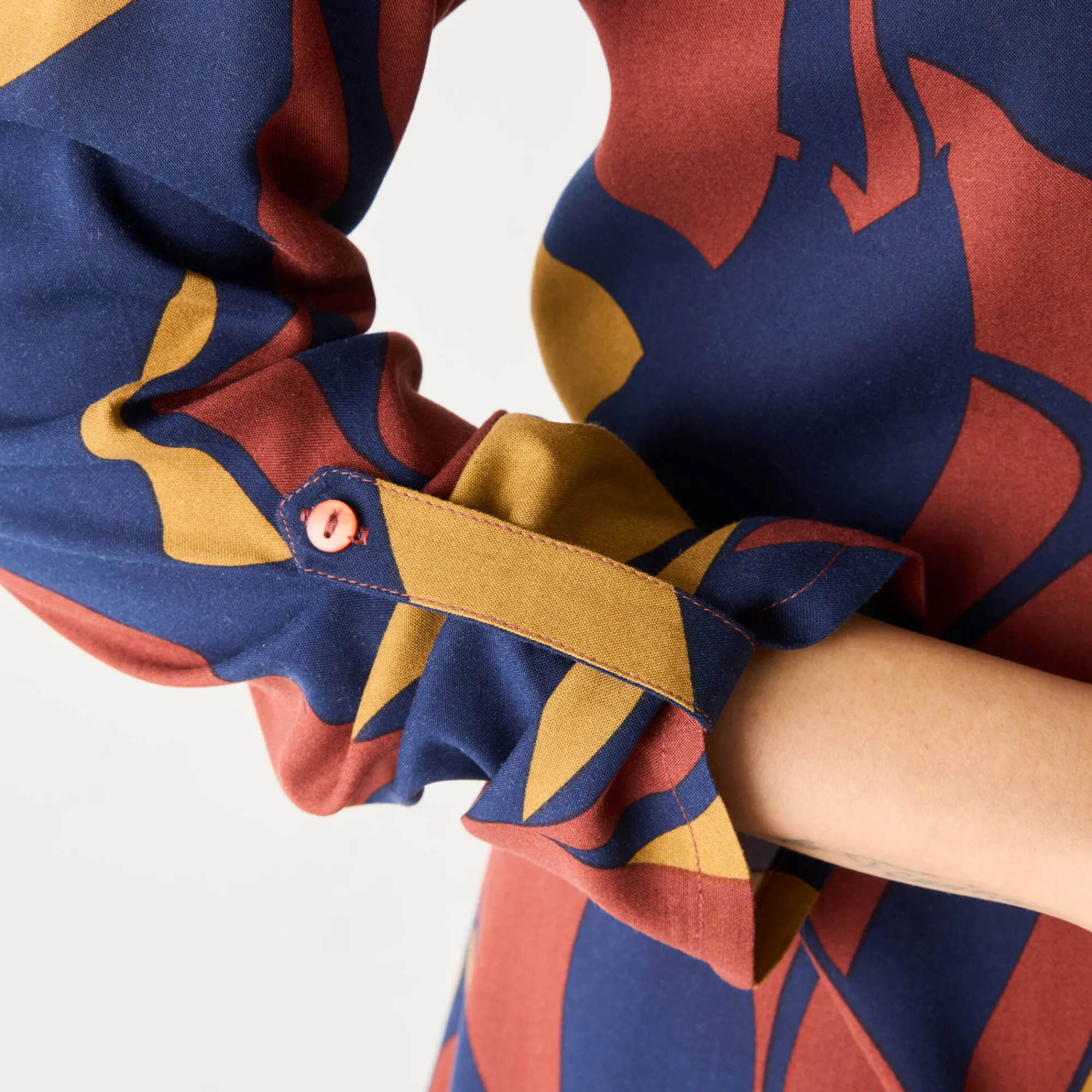 Bloes En Tuniek<Blancheporte Uitlopende tuniek met knopen en grafische print marine / kerrie
